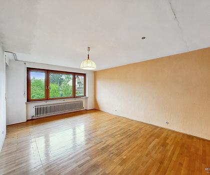 Freundliche Wohnung mit Gartenanteil, Balkon und Garage in ruhigem 3-Familien-Haus